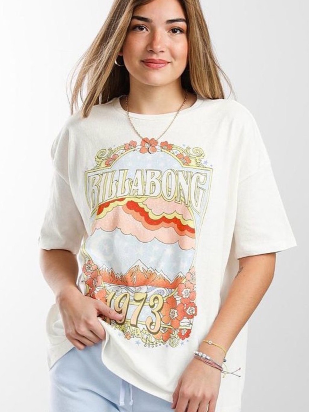 Billabong Cream Graphic Tee with Pastel Orange, Pink & Blue Retro Print